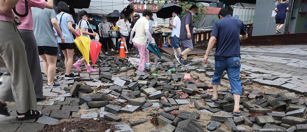 Νότια Κορέα: Πρωτοφανείς βροχοπτώσεις προκάλεσαν χάος (εικόνες)