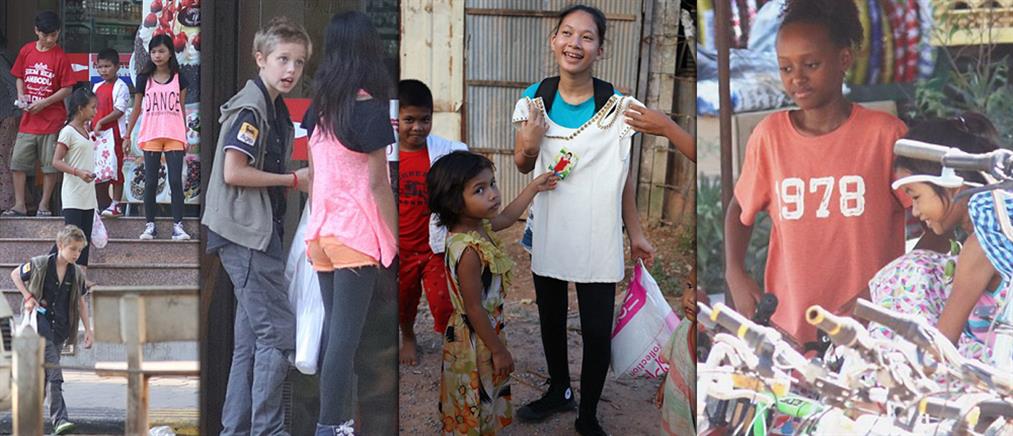 Οι κόρες της Τζολί χαρίζουν χαμόγελα στα παιδιά της Καμπότζης (φωτό)
