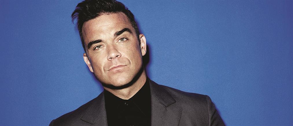 Ο Robbie Williams προσγειώθηκε πάνω στο χέρι θαυμάστριάς του!