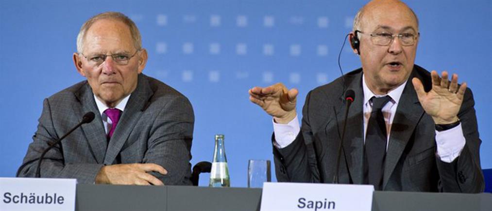 Σόιμπλε – Σαπέν: Υπέρ του φόρου στις χρηματοπιστωτικές συναλλαγές πριν τις Ευρωεκλογές