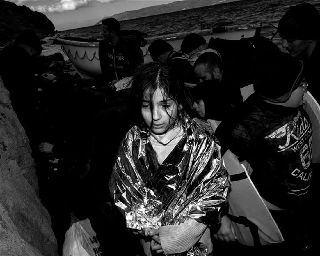 Αγγελος Τζωρτζίνης - φωτογραφία - πρόσφυγες